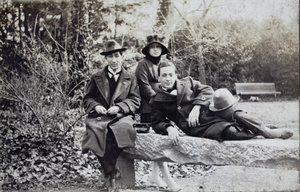 Tom Hutchinson and John Piry with a young woman in Jessfield Park, Shanghai