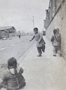 Chinese children playing in a street, Shanghai