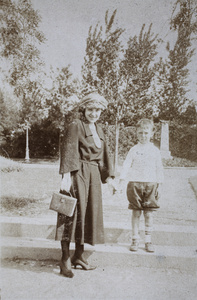 Margie Hutchinson and a boy, by the monument to René Vallon, Parc de Koukaza (French Park), Shanghai