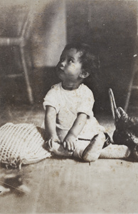 Bea Hutchinson sitting on the floor of a summer house, Moganshan