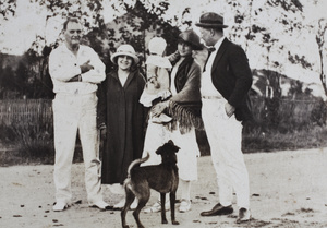 Unidentified man with Margie, Bea, Sarah and Charles Hutchinson, and a dog, Wusong, September 1923  