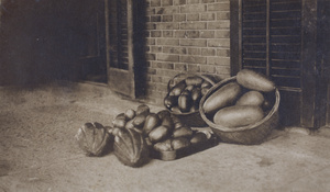 Squashes and winter melon wax gourds of different sizes on the verandah, 35 Tongshan Road, Hongkou, Shanghai