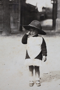 Bea Hutchinson wearing her father's SVC hat, Tongshan Road, Hongkou, Shanghai 