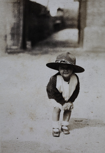 Bea Hutchinson wearing her father's SVC hat, Tongshan Road, Hongkou, Shanghai