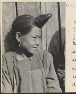 Woman with traditional teapot hairstyle in the Lost Tribe country
