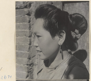 Woman with teapot hairstyle in the Lost Tribe country