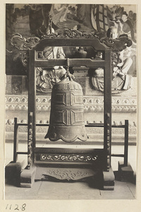 Interior view of Da cheng ge at Da Fo si showing a bell