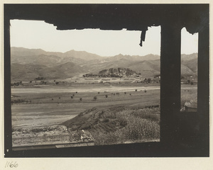 View from a window of Pu du dian at Yi li miao showing a general view of Da Fo si
