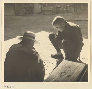 Men playing a board game in Baoding