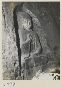 Cave interior showing rock-cut Buddha at the Xincheng Caves