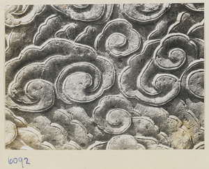 Detail of a stone altar showing relief carving of clouds at Xian nong tan