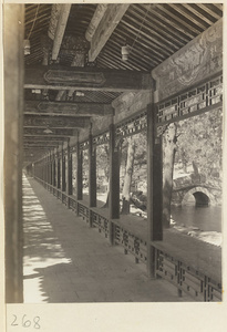 Chang lang with bridge in background at Yiheyuan (Summer Palace), Beijing