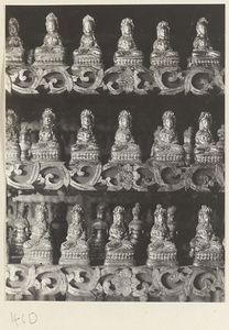 Detail of a temple wall showing Bodhisattva reliefs