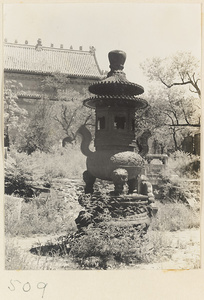 Incense burner on grounds next to temple building at Yuquan Hill