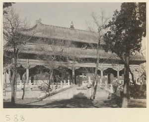 Double-eaved temple building with terrace and incense burner at Huang si