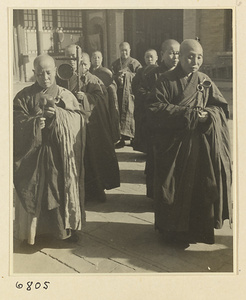 Procession of Buddhist nuns playing musical instruments