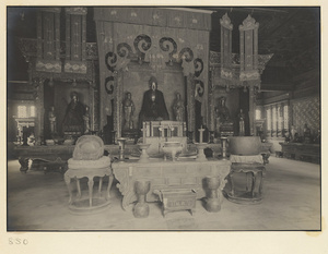 Interior of Wan shan dian showing main altar with statues of Buddha, Bodhisattvas, and attendants