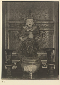 Interior of Wan shan dian showing altar with shrine figure