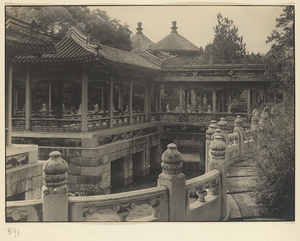 Curved balustrade, covered walkway, and roofs of Shuang huan wan shou ting at Nanhai Gong Yuan