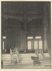 Interior view of Qi nian dian showing raised platform with carved screen and emperor's throne