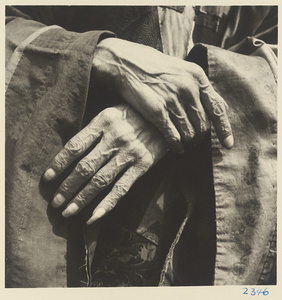 Hands of a Daoist priest at Bai yun guan