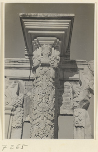 Carved marble column and capital from a ruined building at Yuan Ming Yuan
