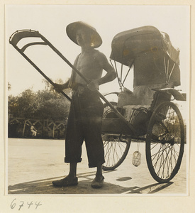 Man pulling a rickshaw
