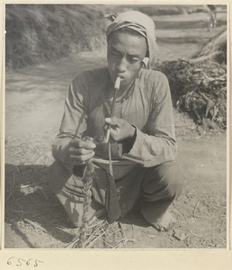 Farmworker smoking a pipe