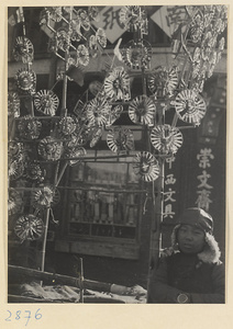 Boy selling pinwheels at New Year's