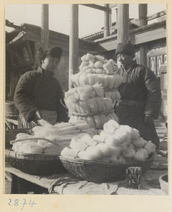 Street vendor selling noodles at New Year's