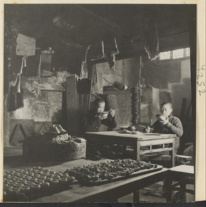 Bakery workers eating a meal in a bakery