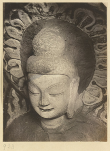 Detail showing the head of a statue of Buddha at the Yun'gang Caves