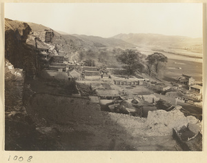 General view of the temple buildings at the east end of the Wuzhou Cliff and surrounding valley