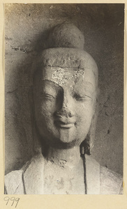 Detail showing the head of relief figure of a Buddha at the Yun'gang Caves