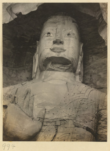 Detail of Cave 20 at Yun'gang showing the head and hand of a statue of Buddha