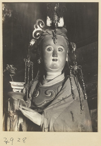 Detail of a statue of the goddess Sheng Mu wearing a phoenix headdress on Hua Mountain