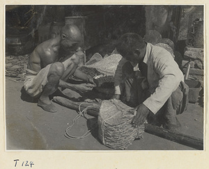 Men with a stack of dried abalone in Tai'an