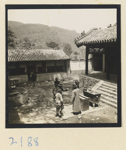 Pilgrims in a temple courtyard on Miaofeng Mountain