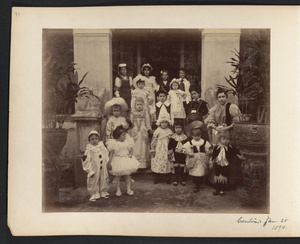 Dora and Lucy Drew (back row, left) and other children dressed for costume party, Canton