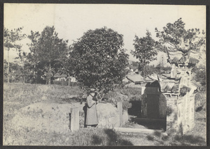 Outside Nanking.  Grave of Lieo Kai-lien, Moslem writer of Manchu Dynasty.  Rev. W. J. Drummand at grave.