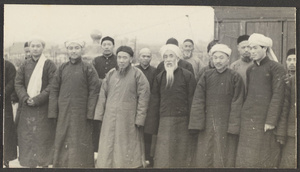 On roof of mosque.  Always ready for a picture.  Moslem merchants from Honan Prov[ince] in Hankow.