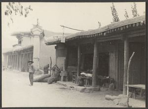 Through the Great Hsia.  Entrance to our Moslem inn at Lao Hwa Cheng.  Here old cart road from Pienfan connected with Sining R. Valley.  HUC traveled the cart road.