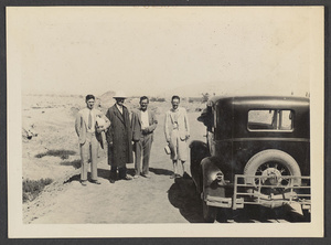 Lanchow, Kansu.  Four of a kind & the Famine Relief car.