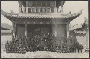 Weichow, Ningsia.  Mosque school children & minaret (bottom).