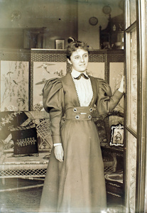 Ethel Mary Maitland (née Wilcockson) by a doorway, Shanghai
