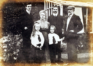 Family group at Point House, Woodborough Road, Putney, London