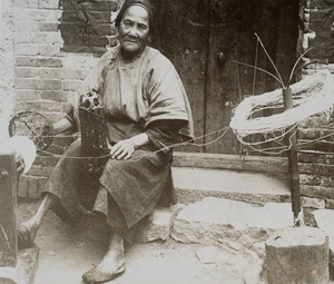 A woman spinning yarn
