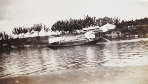 A sampan on a waterway