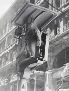 A dead Sikh policeman in traffic light control tower, Shanghai, 23 August 1937