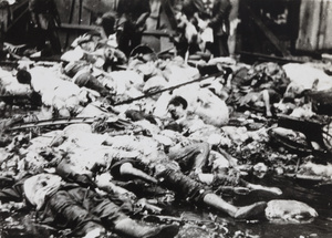 Victims of bombing, Avenue Edward VII and Yu Ya Ching Road, Shanghai, 14 August 1937